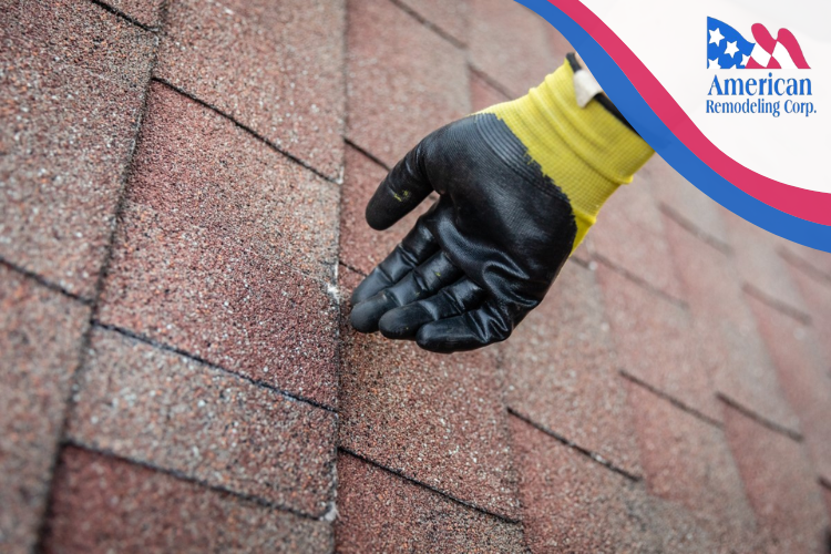A professional Bowie Roofing contractor inspecting roof shingles for seasonal preparedness